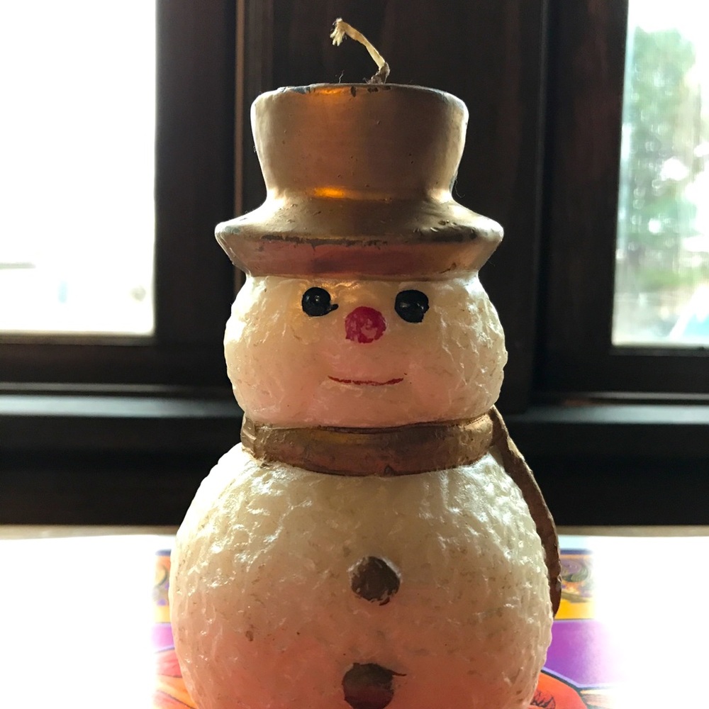 Vintage snowman candle